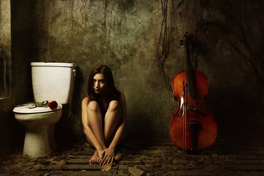 Melancholy Woman and Cello by Lita Pratikto — canvas wall art
