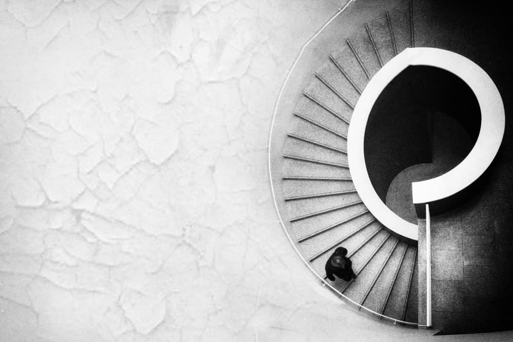 Lone Figure Spiral Staircase by Laura Mexia — canvas wall art