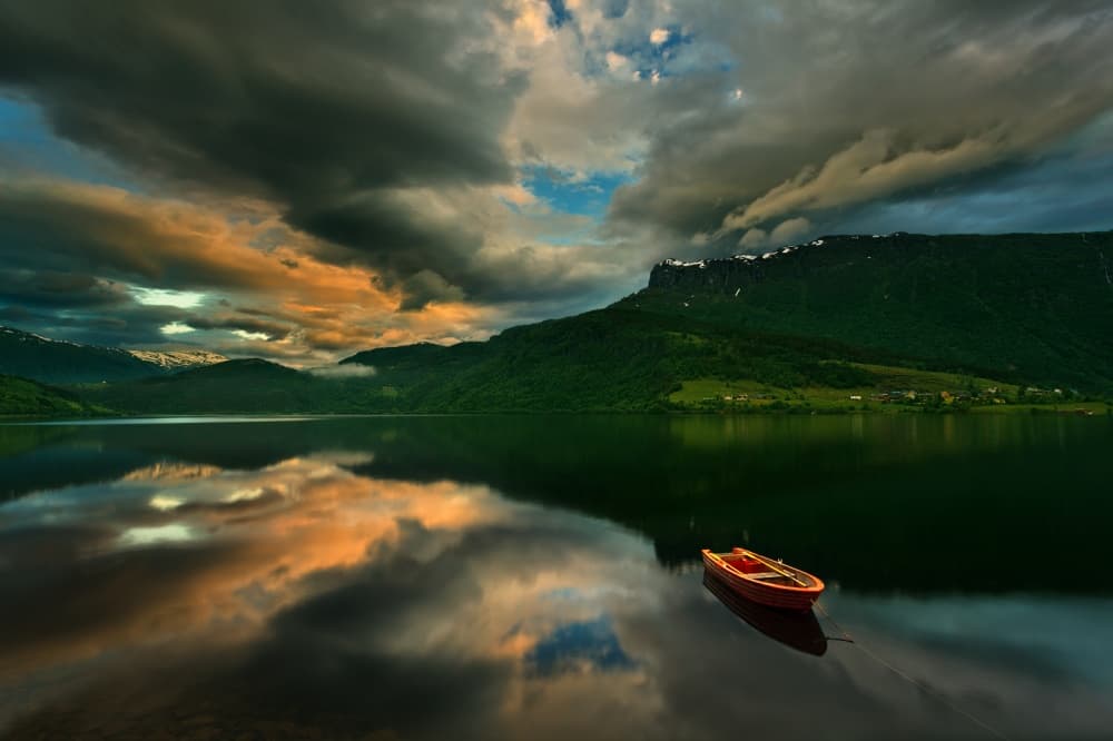 Moody Mountain Lake Boat by Krzysztof Browko — canvas wall art