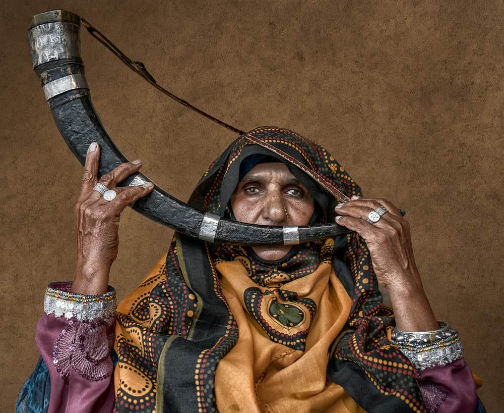 Traditional Woman with Horn by Haitham AL Farsi — canvas wall art