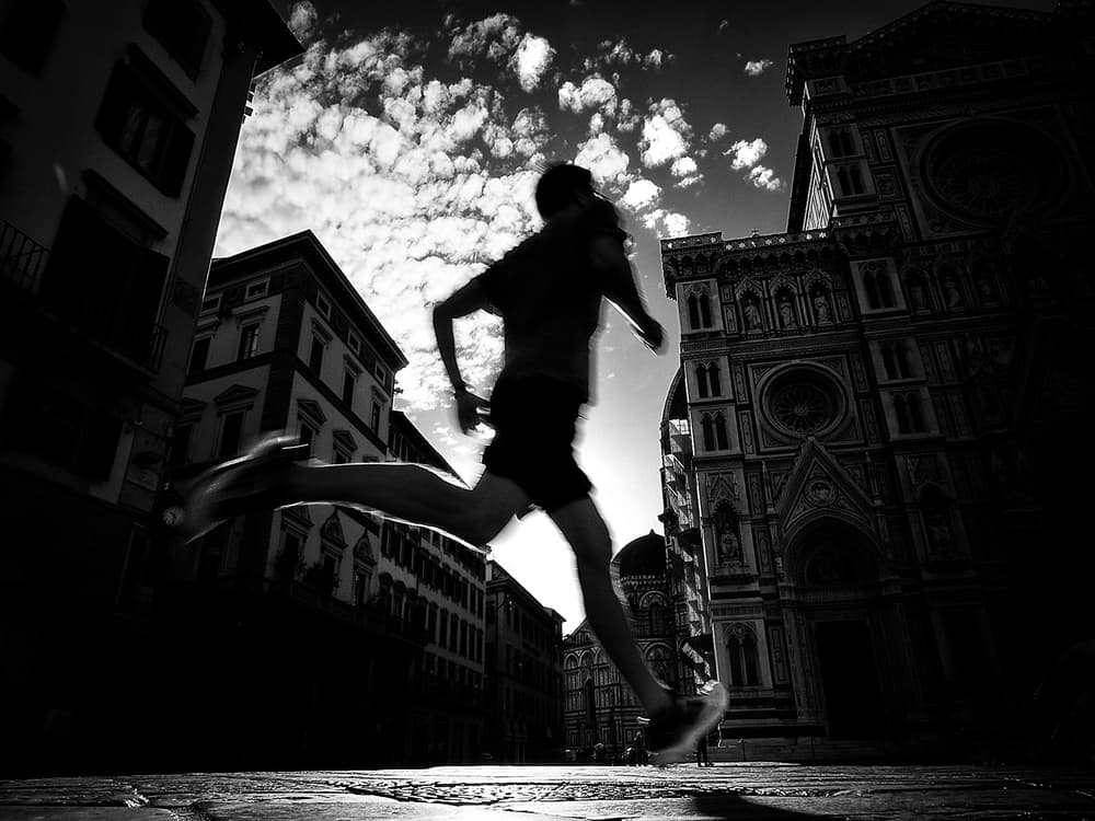 Dynamic City Runner Silhouette by Mirela Momanu — canvas wall art