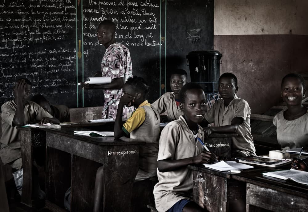 Young Students In Class by Joxe Inazio Kuesta Garmendia — canvas wall art