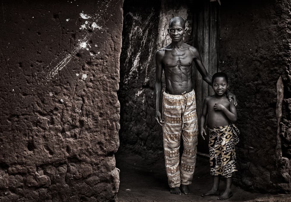 Village Man and Child by Joxe Inazio Kuesta Garmendia — canvas wall art
