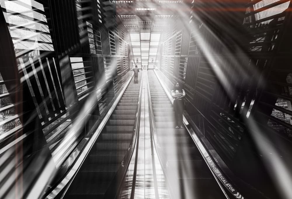 Dramatic Escalator Light Rays by Jurij Bizjak — canvas wall art