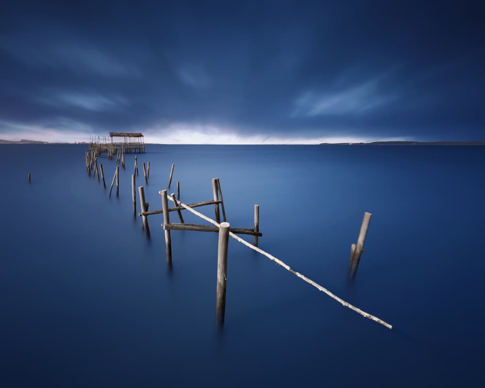 Peaceful Blue Pier by Juan Pablo de Miguel — canvas wall art