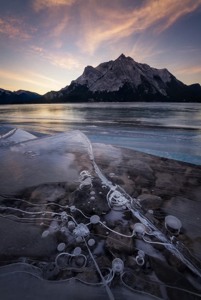 Frozen Lake Sunset by Yongnan Li (李永男) — canvas wall art