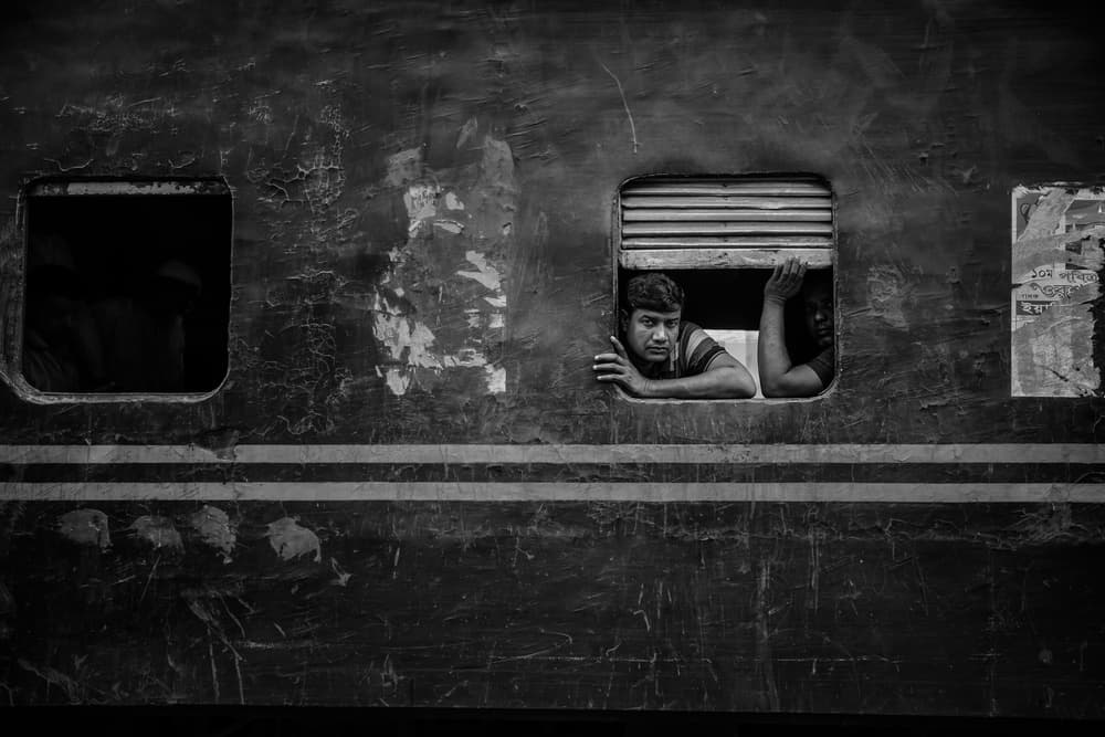Man In Train Window by Richard Huang — canvas wall art