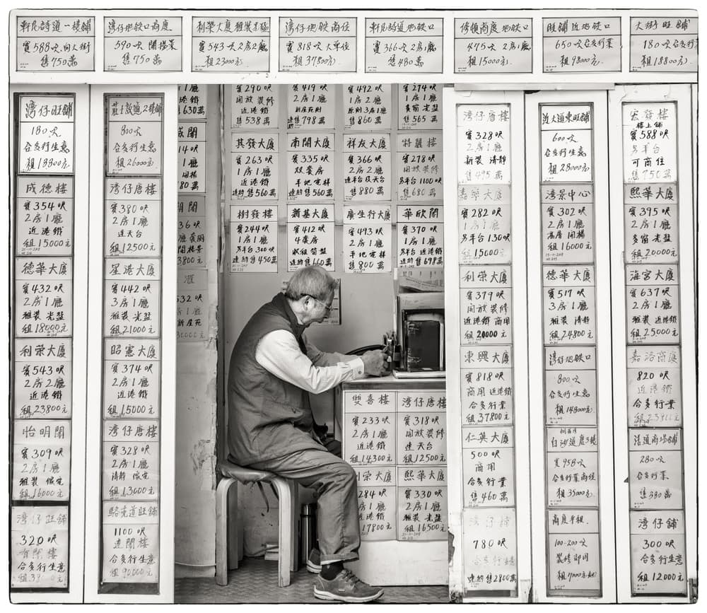 Focused Chinese Shopkeeper by Andreas Agazzi — canvas wall art
