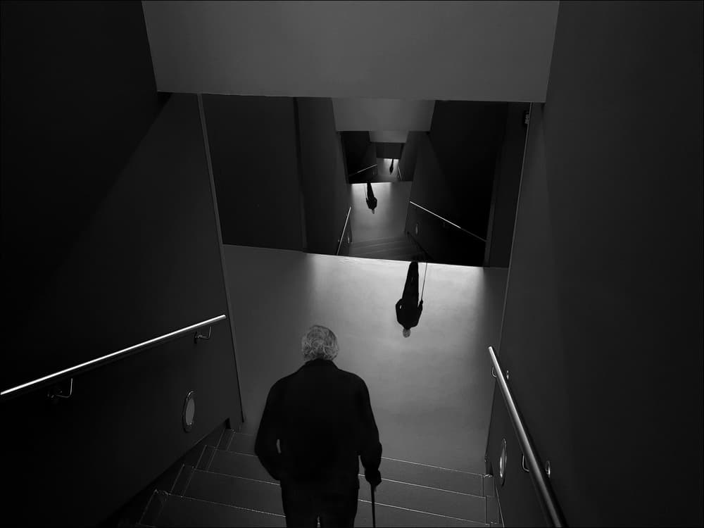 Man on Reflective Stairs by Huib Limberg — canvas wall art