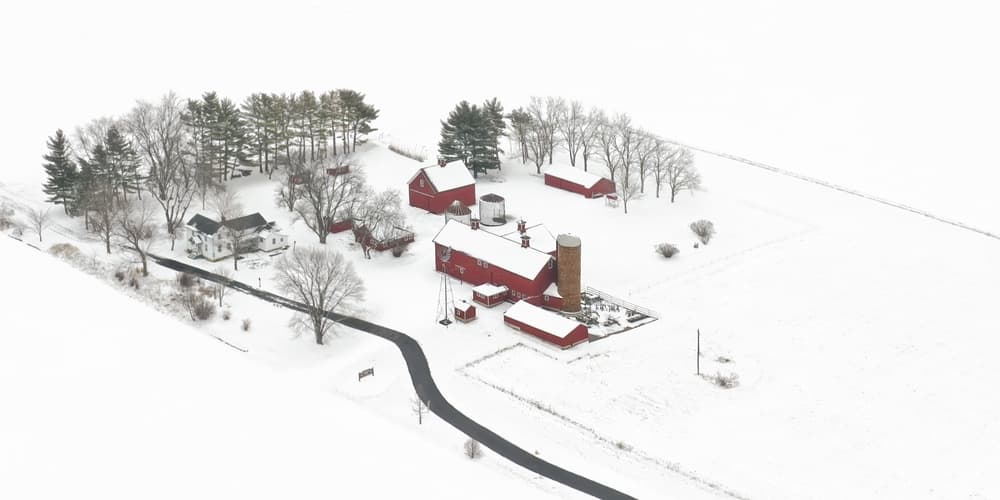 Peaceful Snowy Farm by Hanping Xiao — canvas wall art