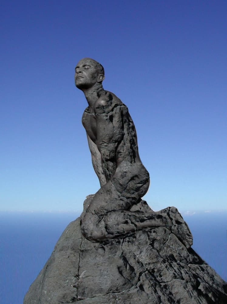 Stone Figure Over Ocean by DDiArte — canvas wall art