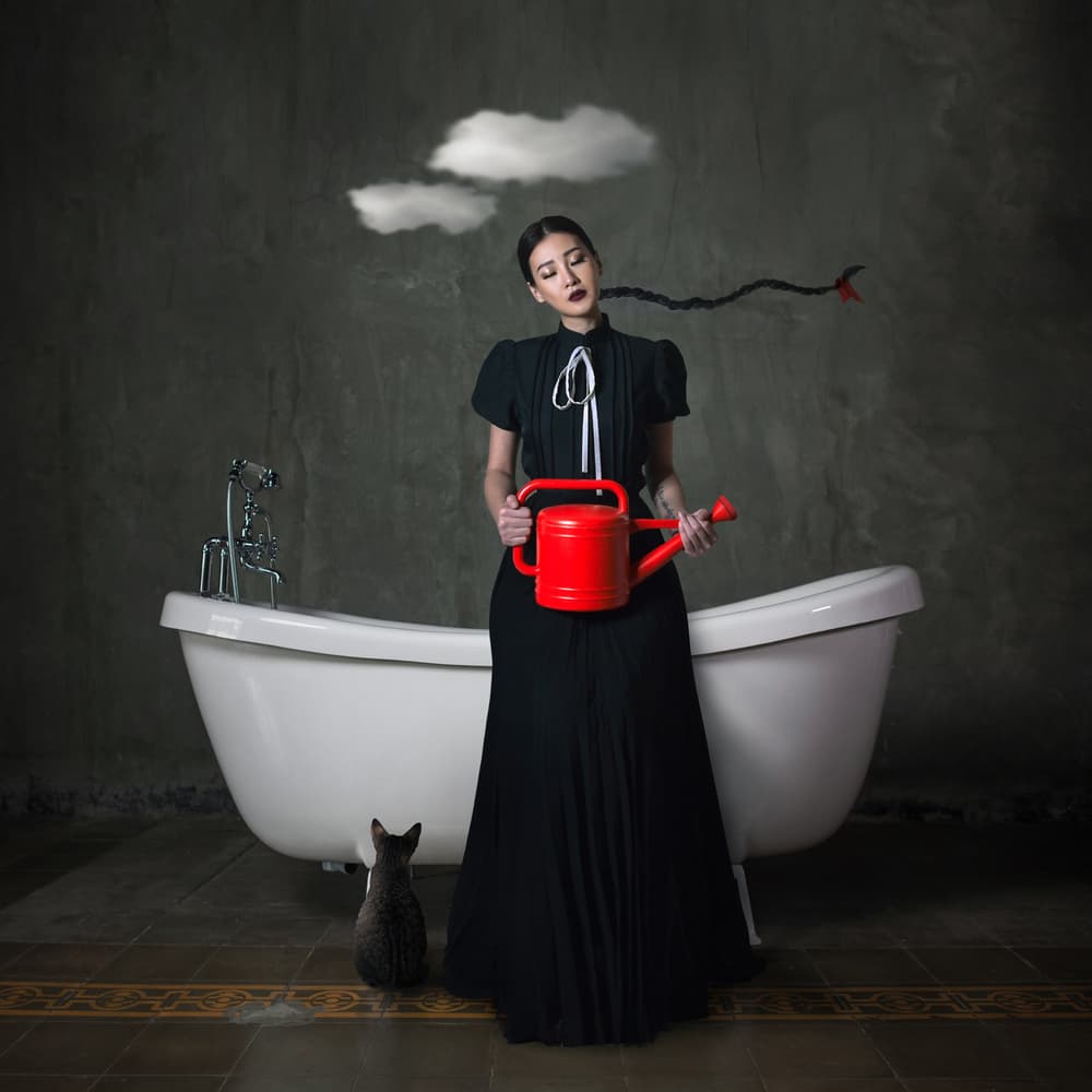 Woman Watering Clouds by hardibudi — canvas wall art