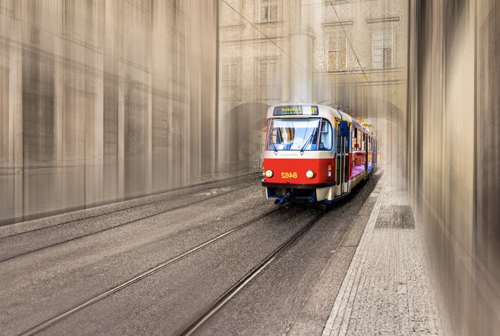 Red Tram in Motion by Kenneth-Wei Zeng — canvas wall art