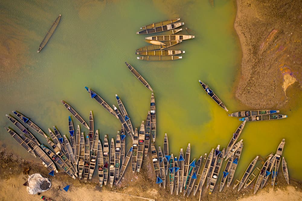 Traditional River Boats by Azim Khan Ronnie — canvas wall art