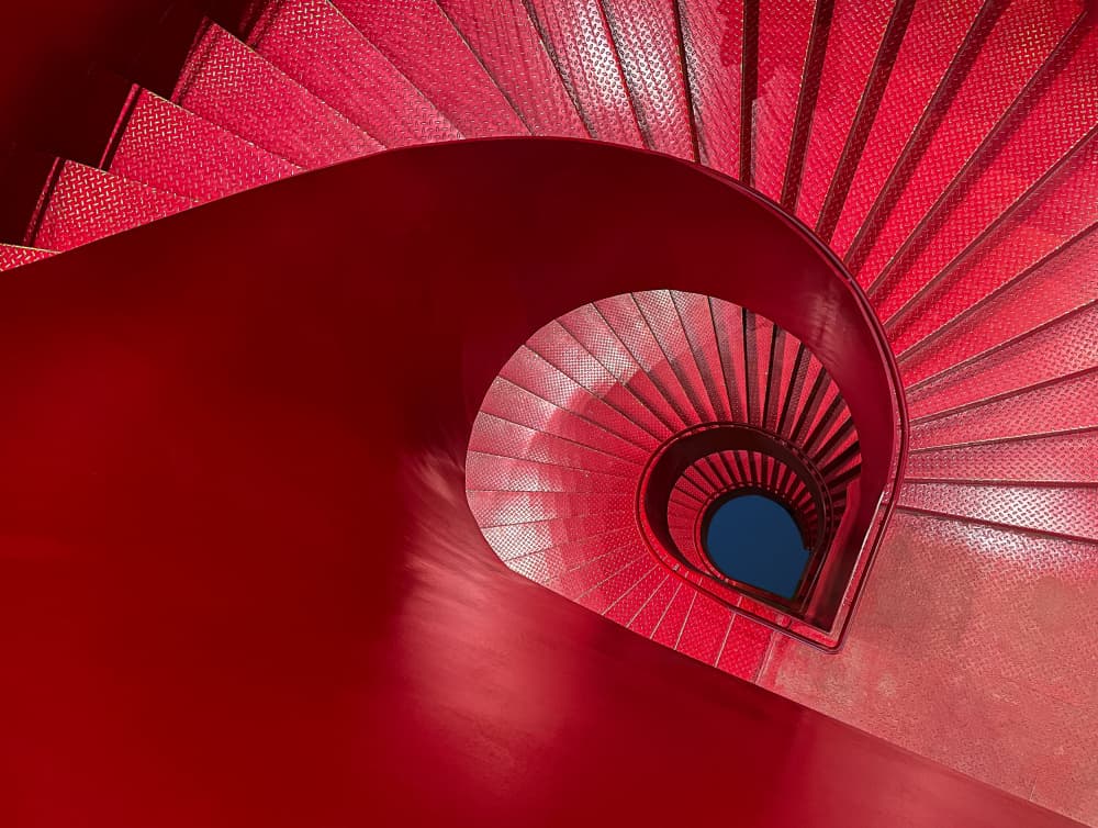 Vibrant Red Spiral Stairs by UU — canvas wall art