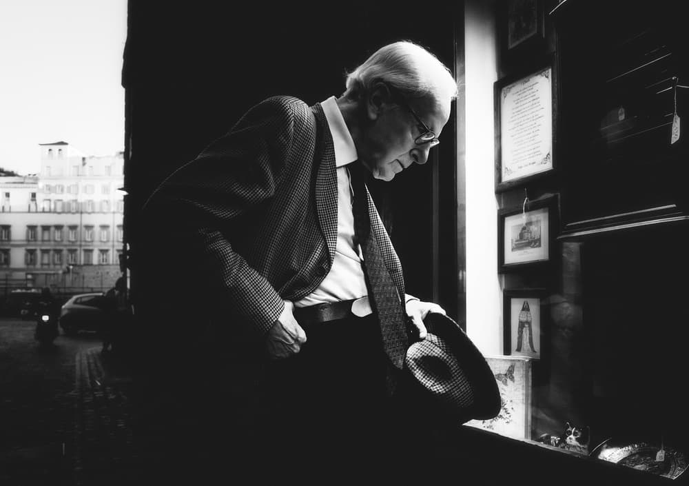 Classic Man Window Shopping by Massimiliano Mancini — canvas wall art