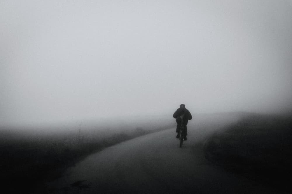 Lone Cyclist in Fog by Renate Wasinger — canvas wall art