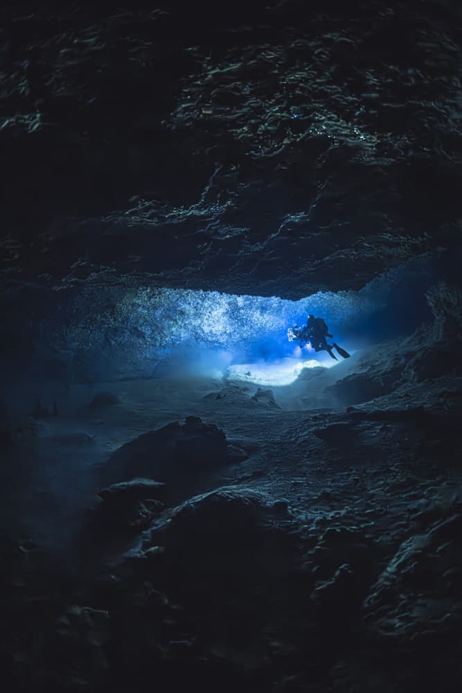 Glowing Underwater Cave by Barathieu Gabriel — canvas wall art