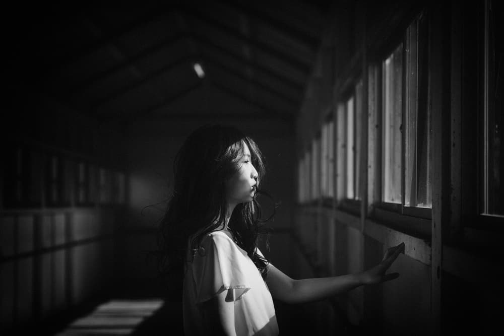 Pensive Woman Window Light by Nobu Ishijima — canvas wall art