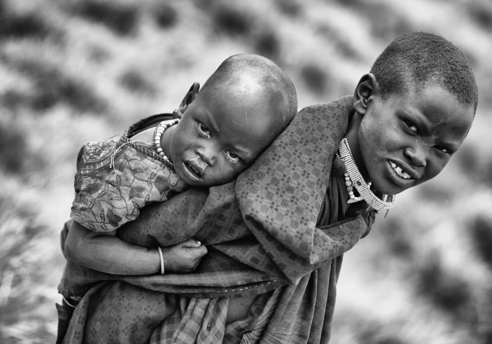 African Childhood Portrait by Goran Jovic — canvas wall art