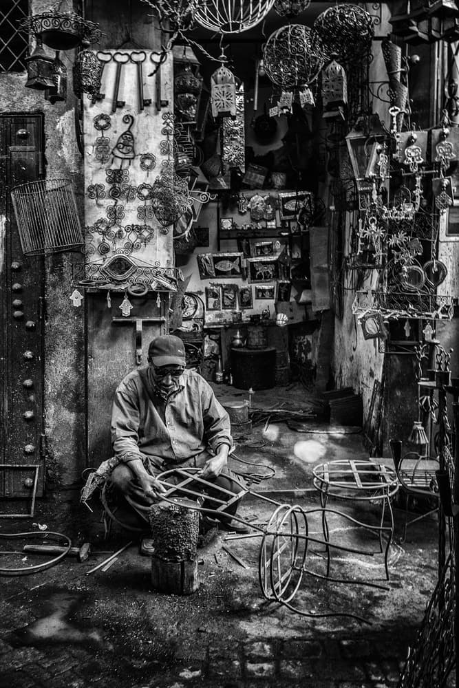Artisan's Busy Shop by Pavol Stranak — canvas wall art