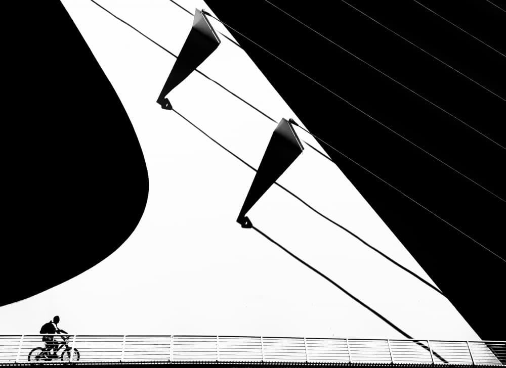 Geometric Bridge Cyclist by Susanne Landolt — canvas wall art