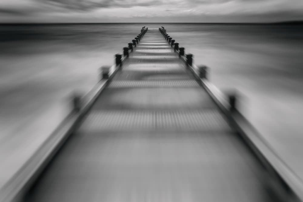 Long Pier Over Ocean by Jean-Louis VIRETTI — canvas wall art