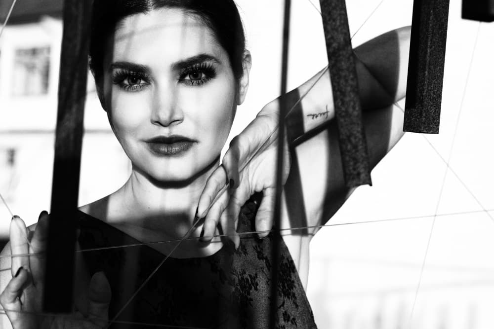 Woman Through Frame by Josefina Melo — canvas wall art