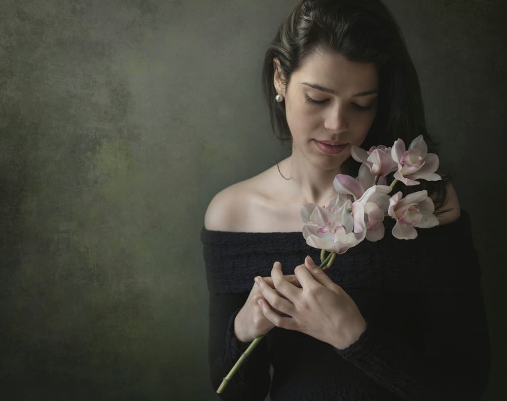 Serene Woman with Orchids by Margareth Perfoncio — canvas wall art
