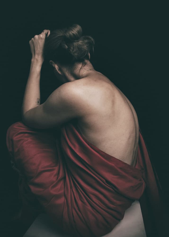 Contemplative Back In Red by Afshin Saeidinia — canvas wall art