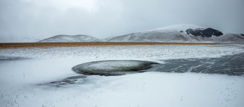 Frozen Winter Landscape by Riccardo Lucidi — canvas wall art
