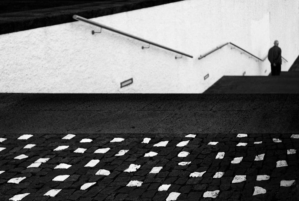 Man on Geometric Stairs by Paulo Abrantes — canvas wall art