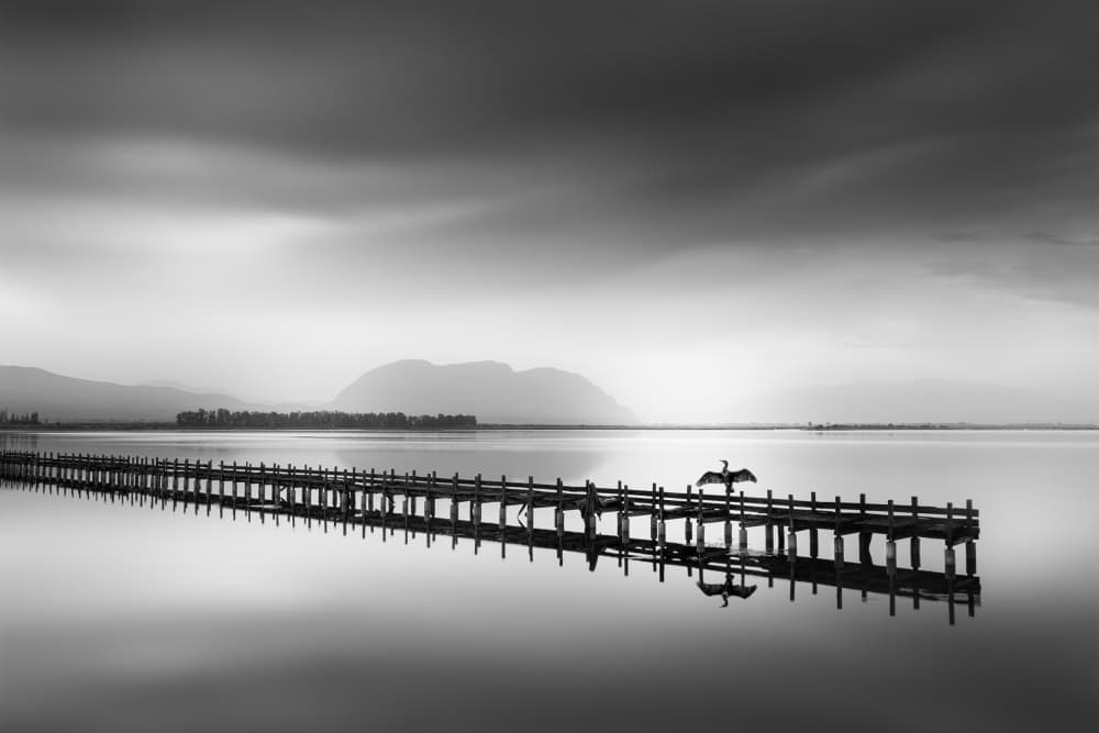 Serene Pier Reflection by George Digalakis — canvas wall art