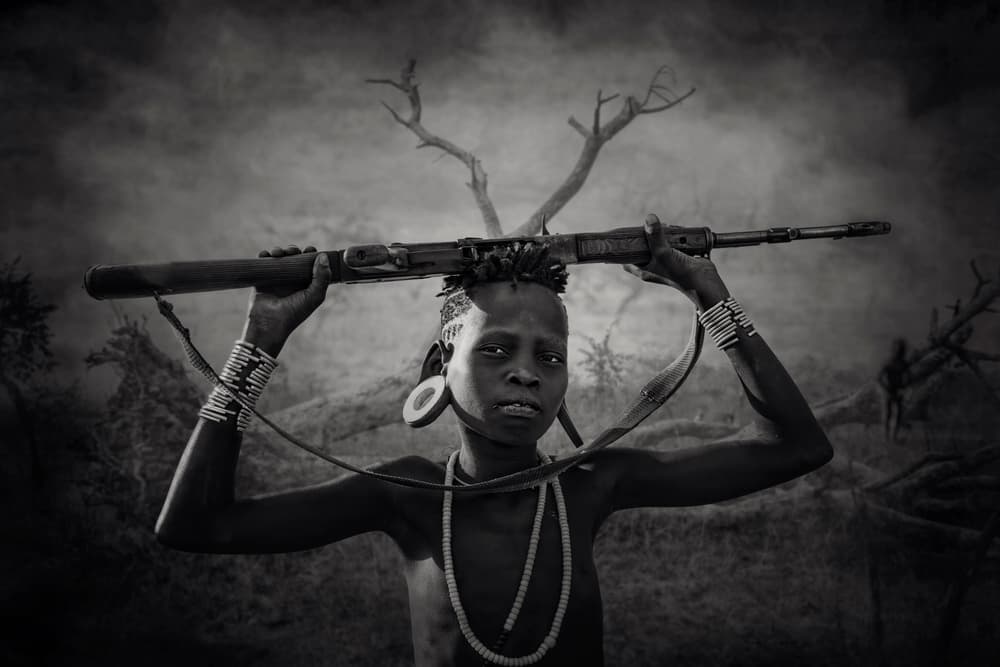 Tribal Youth With Rifle by Svetlin Yosifov — canvas wall art