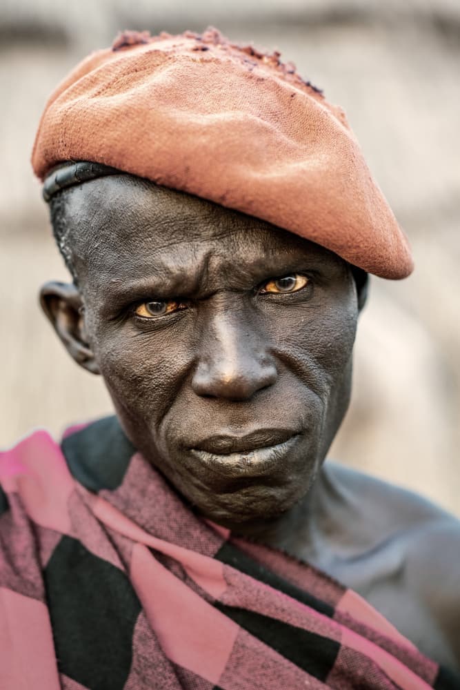 Intense Man Brown Beret by Trevor Cole — canvas wall art