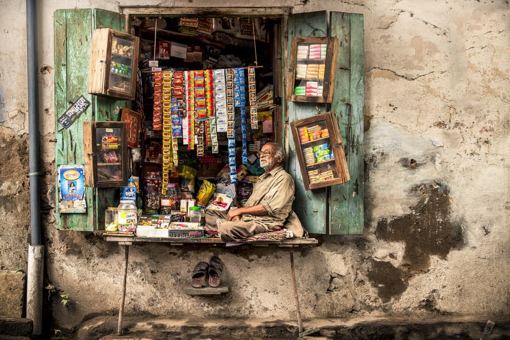 Old Man's Street Shop by Marco Tagliarino — canvas wall art
