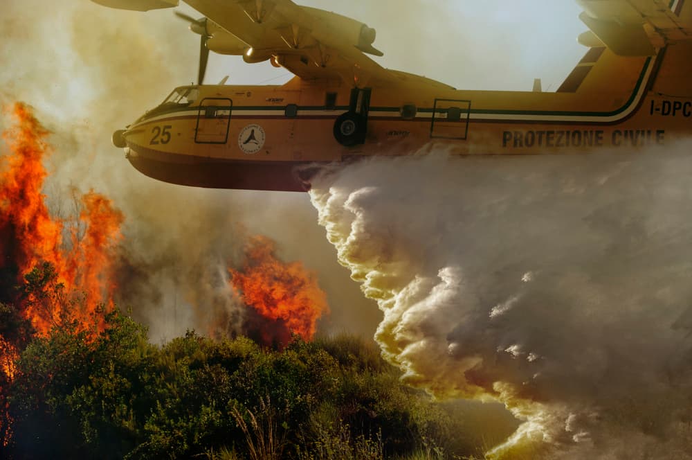 Wildfire Plane Drops Water by Antonio Grambone — canvas wall art