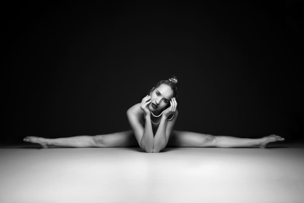 Elegant Split Pose by Angéla Vicedomini — canvas wall art