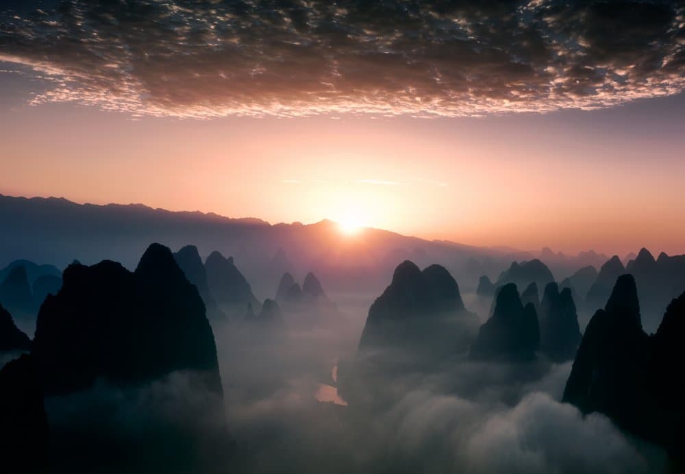 Misty Karst Mountain Sunrise by Fabrizio Massetti — canvas wall art