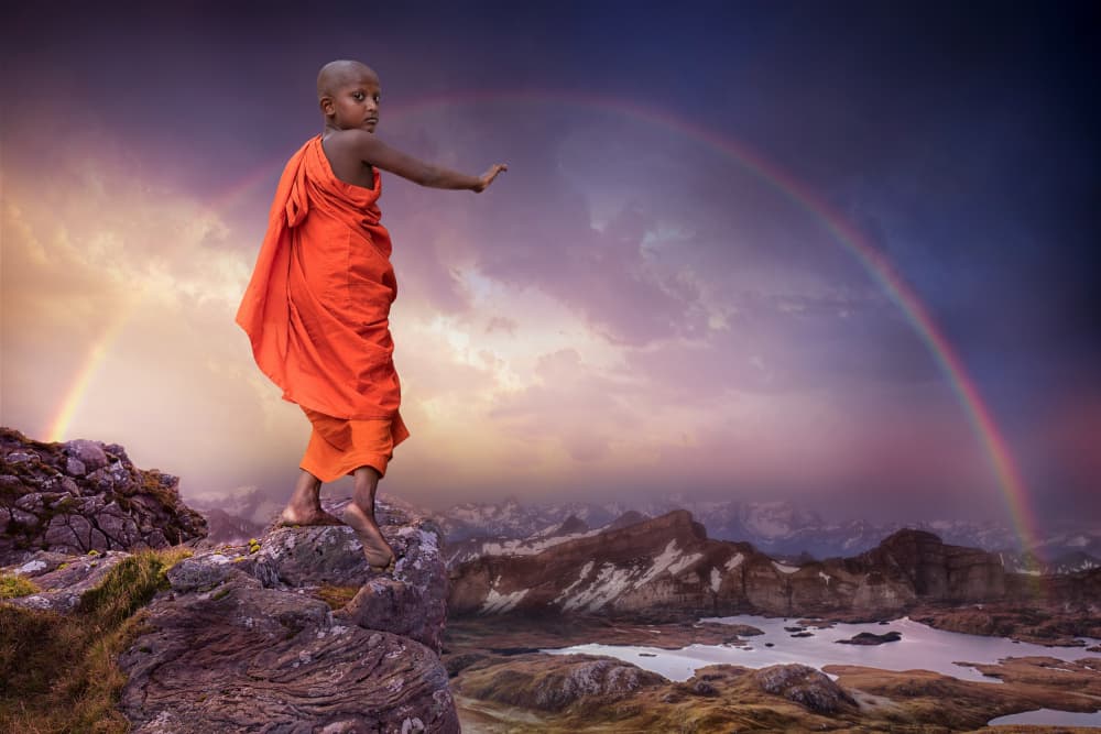 Young Monk Rainbow Mountains by Marcel Egger — canvas wall art
