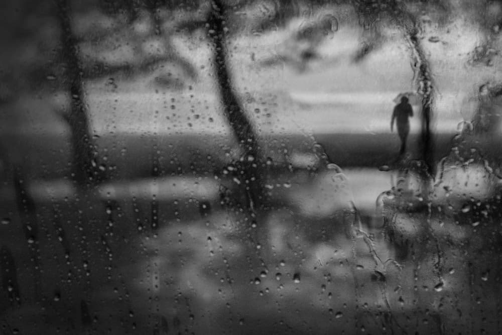 Rainy Beach Stroll by Ekkachai Khemkum — canvas wall art