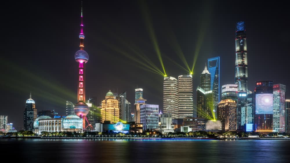 Vibrant City Night Skyline by Dieter Reichelt — canvas wall art