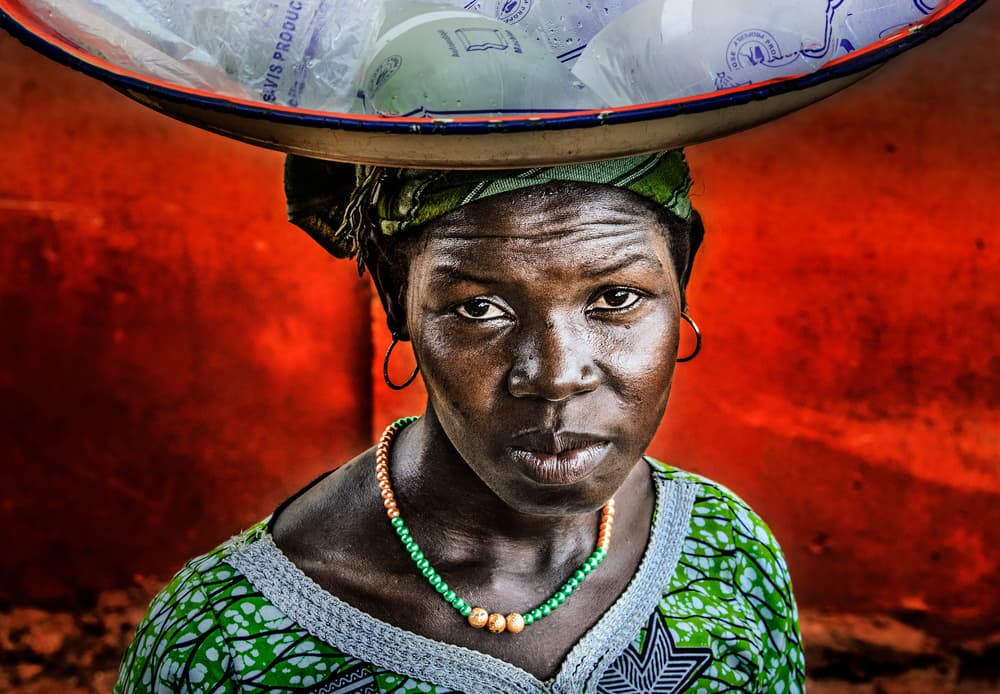 African Woman's Direct Gaze by Joxe Inazio Kuesta Garmendia — canvas wall art