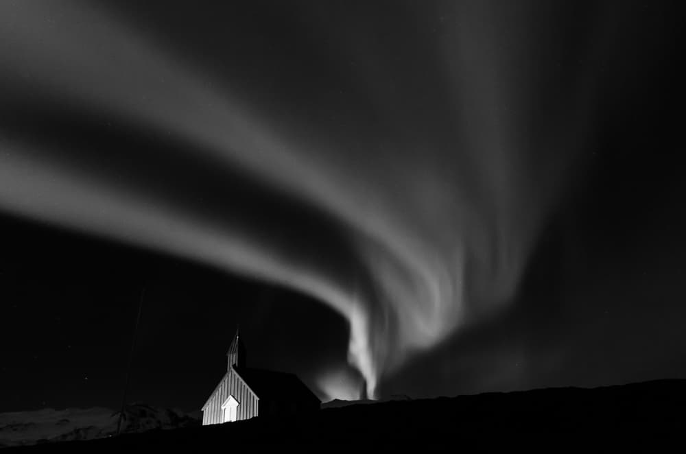 Northern Lights Black Church by Alexander Omarsson — canvas wall art