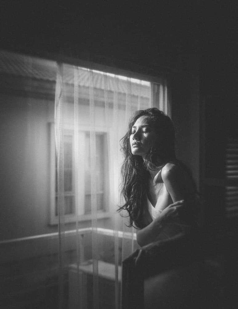 Pensive Window Light by ADIREK M — canvas wall art