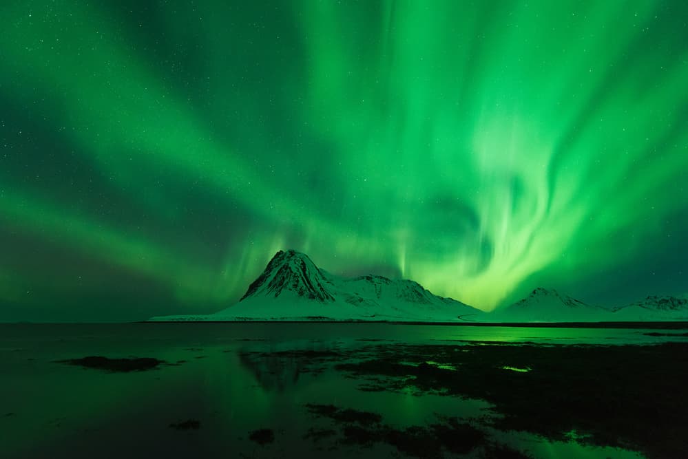 Aurora Mountains Reflection by David Martin Castan — canvas wall art
