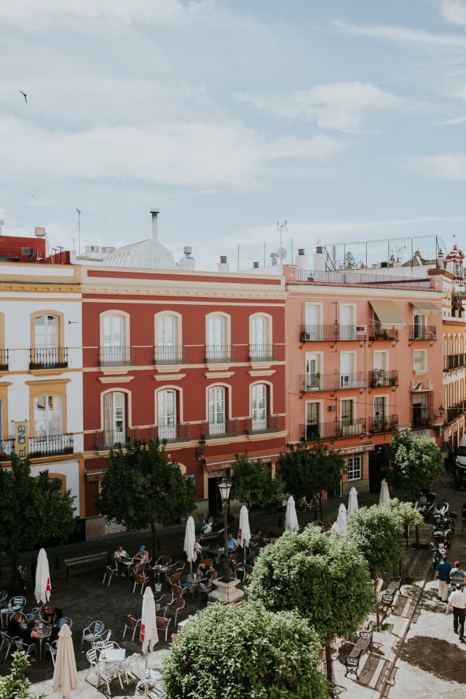 Colorful European Plaza by Claudia Casal — canvas wall art