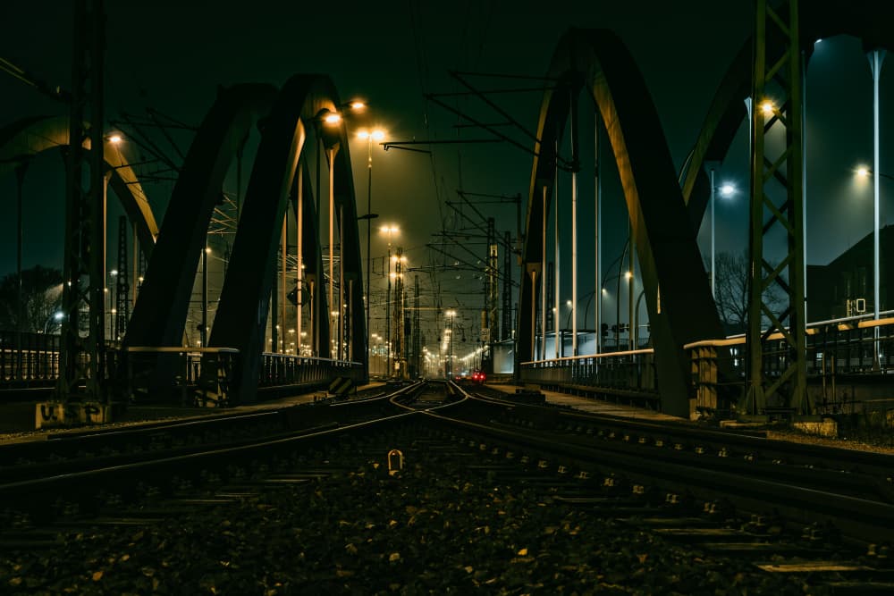Misty Night Train Tracks by Jürgen Muß — canvas wall art