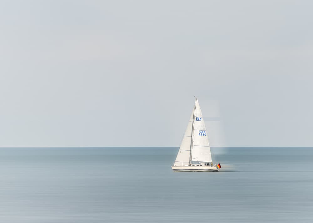 Sailboat on Calm Waters by Christiane Heggemann — canvas wall art