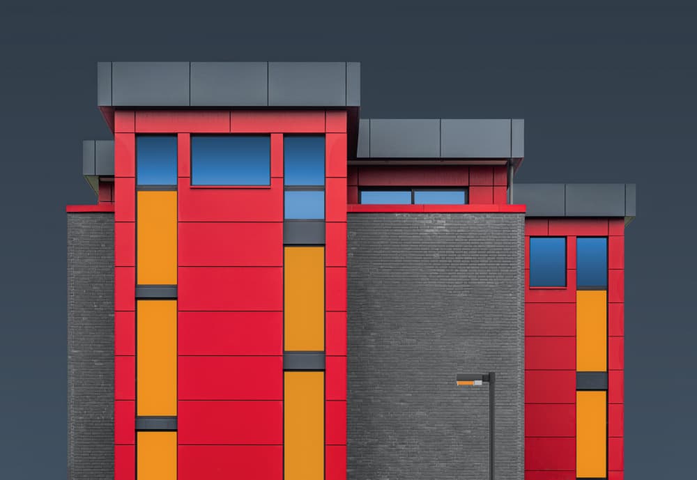 Modern Red Orange Building by Roland M Schwerdtfeger — canvas wall art